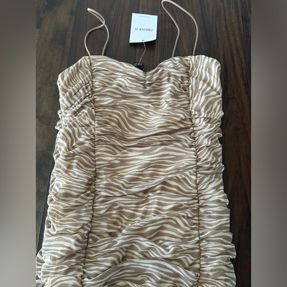 New Forever 21, Size Large Nude Zebra Rushed Dress. Perfect for a party!